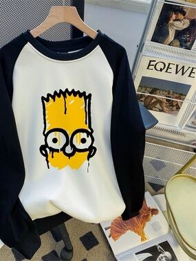 Black & White Graphic Crewneck Sweater with Yellow Cartoon Front